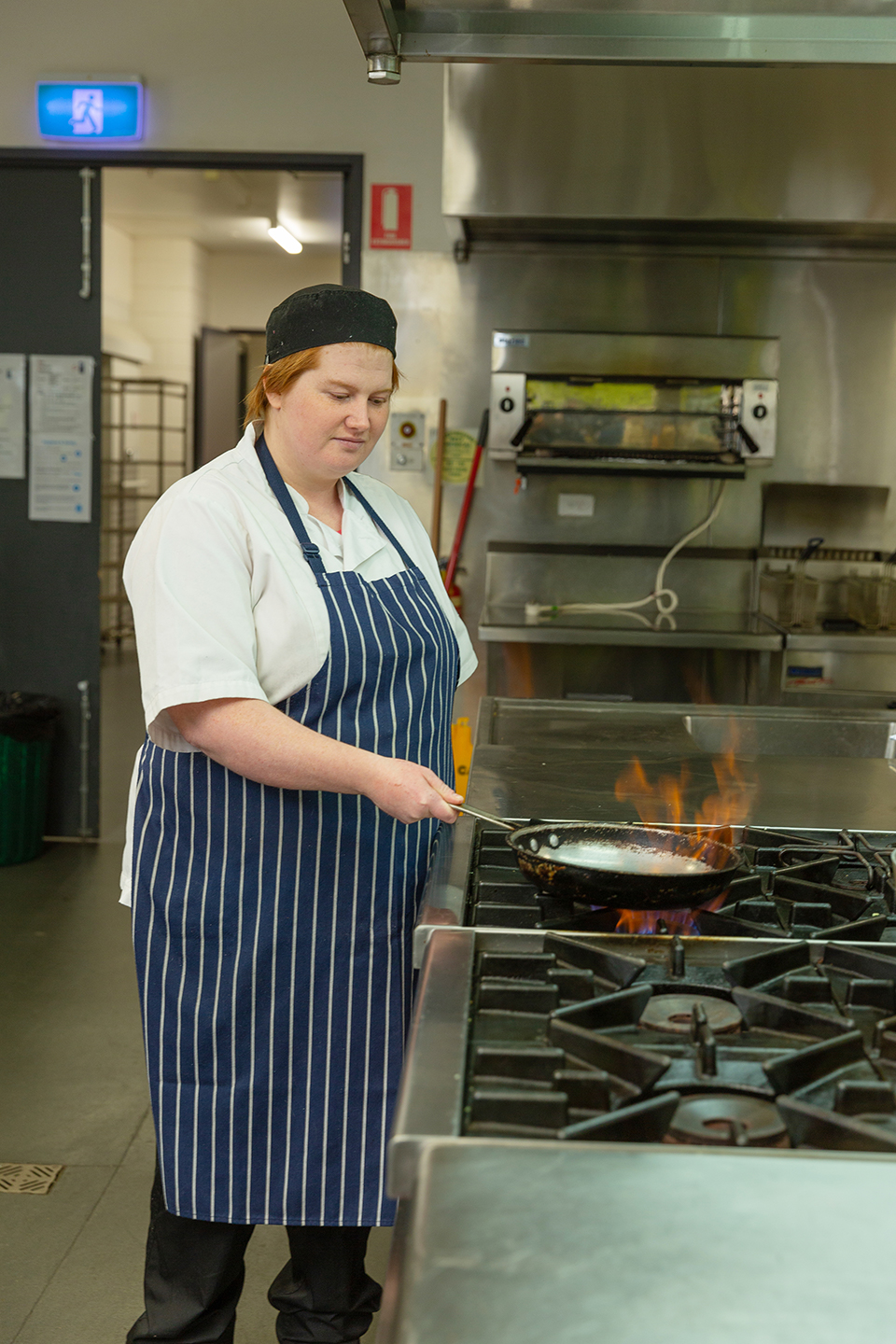 Christina working in the kitchen