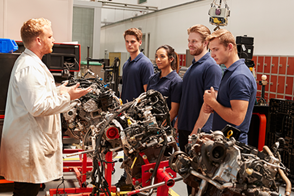 Students learning mechanics at TAFE